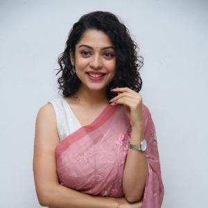 Classic Cultural Style of Actress Varsha Bollamma in a Floral Pink Saree