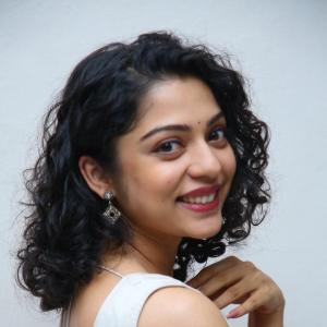 Classic Cultural Style of Actress Varsha Bollamma in a Floral Pink Saree