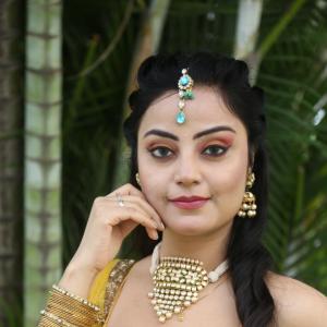 Meenakshi Jaiswal Glows in Traditional Jewellery and Yellow