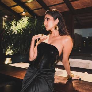 Malavika Mohanan Dazzles in Glossy Black Dress with Modern Accessories