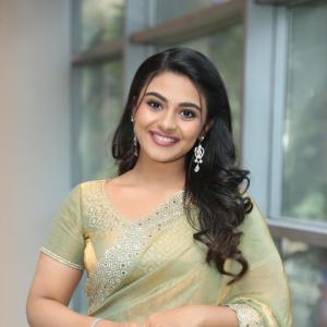 Nayansarika Shines in Elegant Sage Green Saree Look
