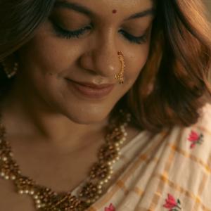 Aparna Balamurali Shines in an Elegant Ivory Saree