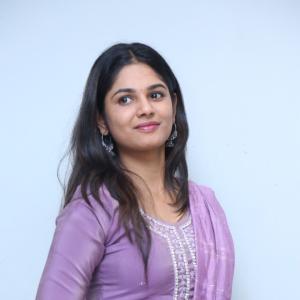 Beautiful Actress RK Dhanusha Stuns in Elegant Purple Traditional Look