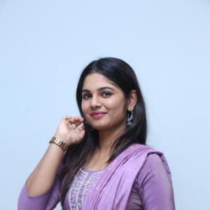 Beautiful Actress RK Dhanusha Stuns in Elegant Purple Traditional Look