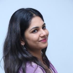 Beautiful Actress RK Dhanusha Stuns in Elegant Purple Traditional Look