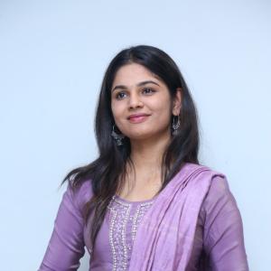 Beautiful Actress RK Dhanusha Stuns in Elegant Purple Traditional Look