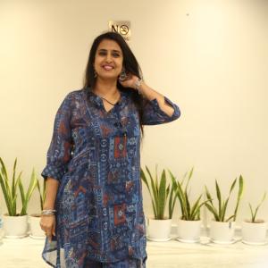 Kasturi Charms in an Elegant Blue Printed Outfit