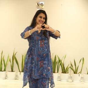 Kasturi Charms in an Elegant Blue Printed Outfit