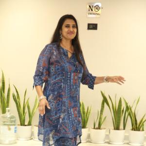 Kasturi Charms in an Elegant Blue Printed Outfit