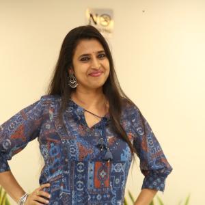Kasturi Charms in an Elegant Blue Printed Outfit