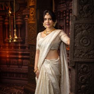 Nabha Natesh Looks Regal in an Ivory Saree and Gold Jewellery