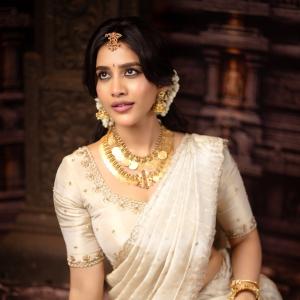 Nabha Natesh Looks Regal in an Ivory Saree and Gold Jewellery