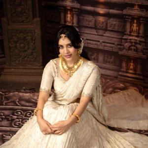 Nabha Natesh Looks Regal in an Ivory Saree and Gold Jewellery
