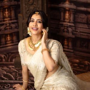 Nabha Natesh Looks Regal in an Ivory Saree and Gold Jewellery