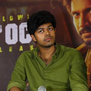 Jason Sanjay Makes a Charming Appearance in Green