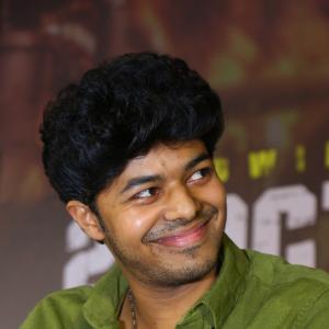 Jason Sanjay Makes a Charming Appearance in Green