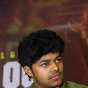 Jason Sanjay Makes a Charming Appearance in Green