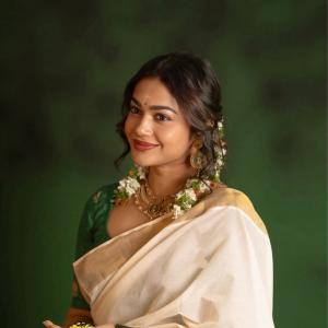 Payal Radhakrishna Pairs an Ivory Saree With Green