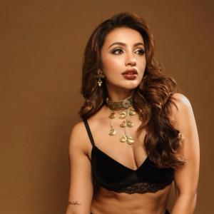Tejaswi Madiwada Pairs a Black Outfit with a Gold Choker