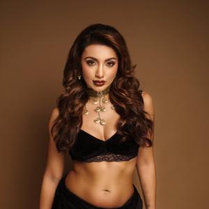 Tejaswi Madiwada Pairs a Black Outfit with a Gold Choker