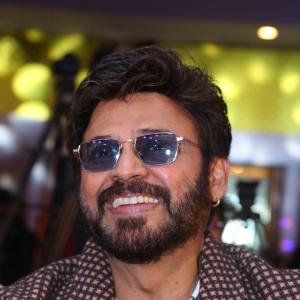 Victory Venkatesh Wears a Patterned Shirt and Sunglasses