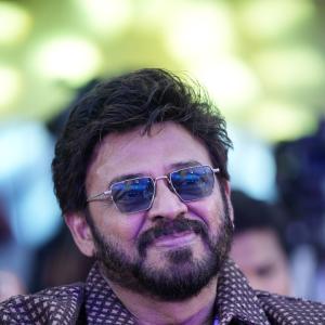 Victory Venkatesh Wears a Patterned Shirt and Sunglasses