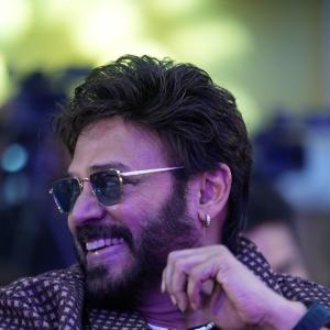 Victory Venkatesh Wears a Patterned Shirt and Sunglasses