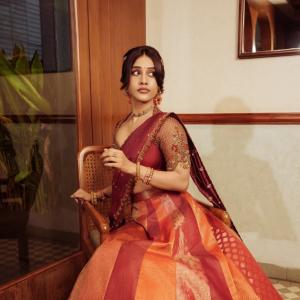 Nabha Natesh Stuns in a Maroon and Gold Saree