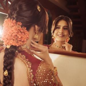 Nabha Natesh Stuns in a Maroon and Gold Saree