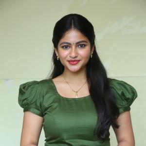 Nakshatra Shines in Green With Simple Gold Accessories