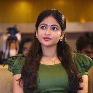 Nakshatra Shines in Green With Simple Gold Accessories