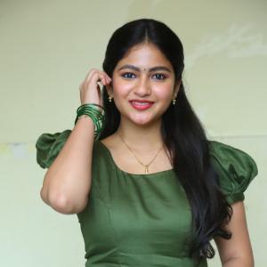 Nakshatra Shines in Green With Simple Gold Accessories