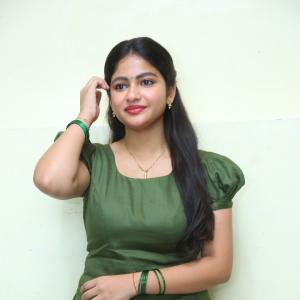 Nakshatra Shines in Green With Simple Gold Accessories