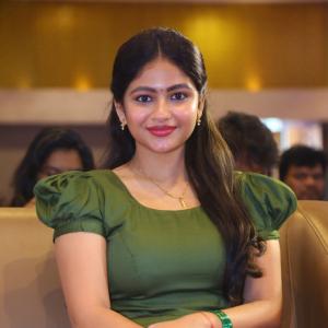 Nakshatra Shines in Green With Simple Gold Accessories