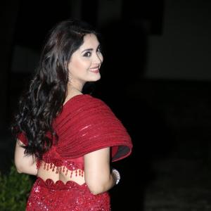 Surabhi Shines in a Glamorous Red Gown
