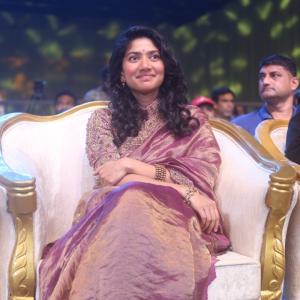 Sai Pallavi smiles in an embroidered purple outfit