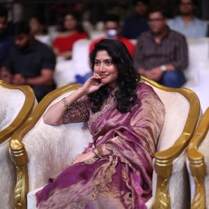 Sai Pallavi smiles in an embroidered purple outfit