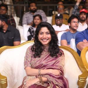 Sai Pallavi smiles in an embroidered purple outfit