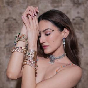 Amyra Dastur showcases a festive purple ethnic look