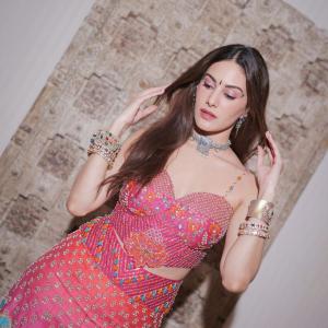 Amyra Dastur showcases a festive purple ethnic look