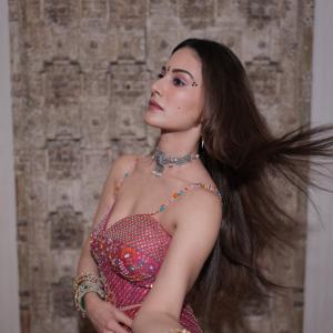 Amyra Dastur showcases a festive purple ethnic look