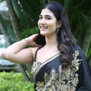 Amrutha Chowdary in an Embroidered Black Saree