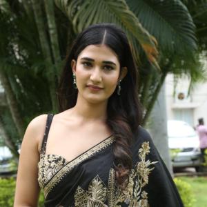 Amrutha Chowdary in an Embroidered Black Saree