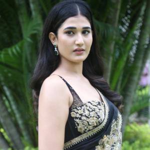 Amrutha Chowdary in an Embroidered Black Saree