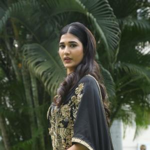 Amrutha Chowdary in an Embroidered Black Saree