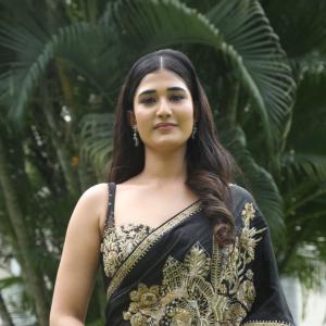 Amrutha Chowdary in an Embroidered Black Saree