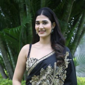 Amrutha Chowdary in an Embroidered Black Saree