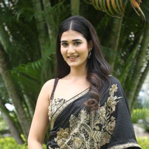 Amrutha Chowdary in an Embroidered Black Saree