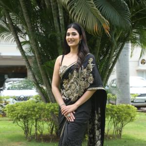 Amrutha Chowdary in an Embroidered Black Saree