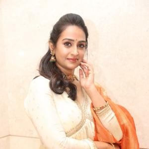 Actress Laya Elegant Ethnic Look in Cream Anarkali with Orange Dupatta